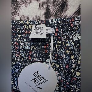 Princess Polly floral romper size 4